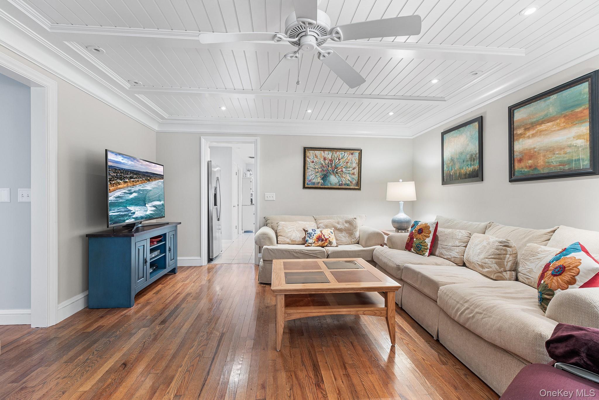 7 Byram Meadows Road Armonk, NY 10504 - Photo 7 of 32 a living room with furniture and a flat screen tv