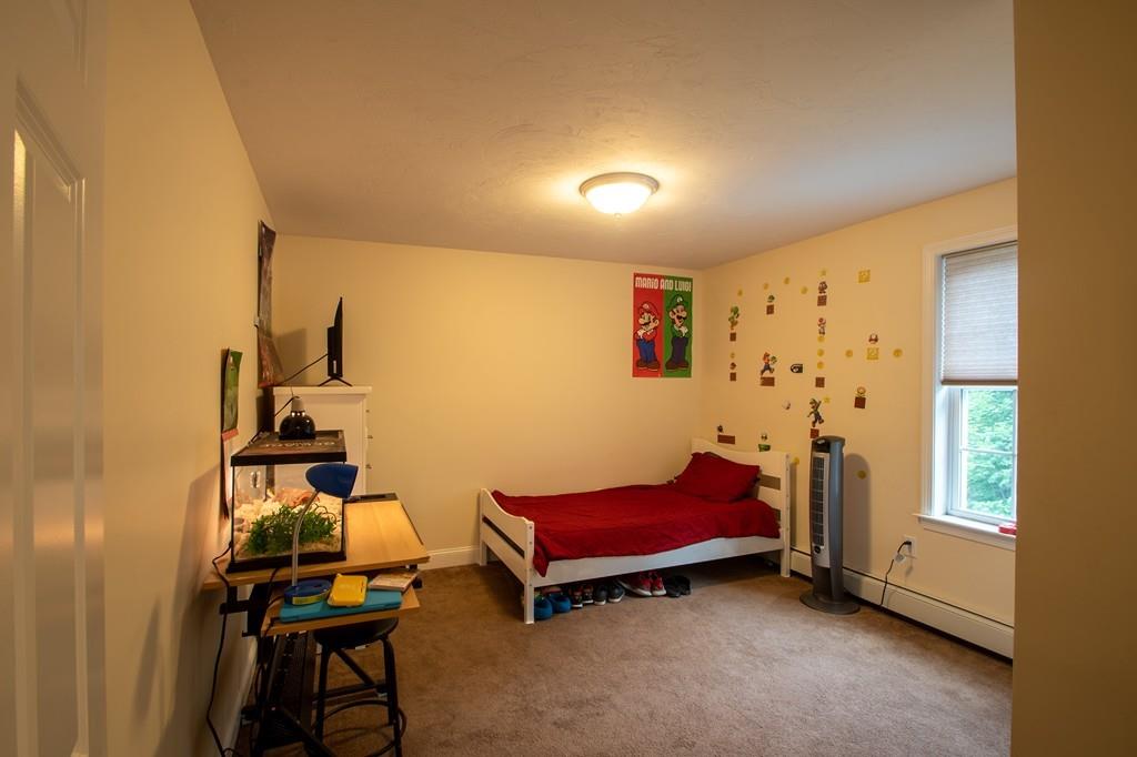 70 Frederick Street Fitchburg, MA 01420 - Photo 12 of 19 a room with furniture and window