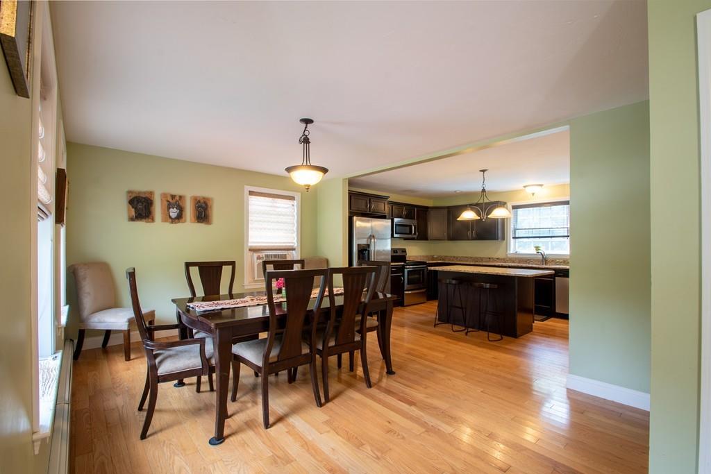 70 Frederick Street Fitchburg, MA 01420 - Photo 4 of 19 a view of a dining room with furniture and wooden floor