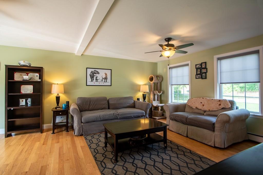 70 Frederick Street Fitchburg, MA 01420 - Photo 5 of 19 a living room with furniture and a couch