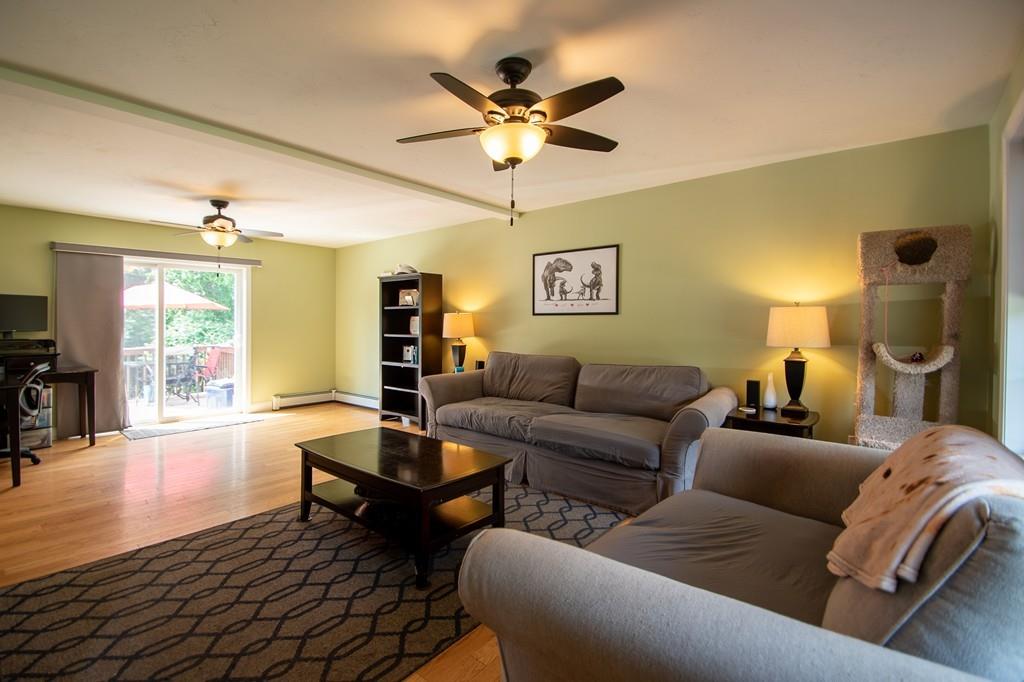 70 Frederick Street Fitchburg, MA 01420 - Photo 7 of 19 a living room with furniture and a large window