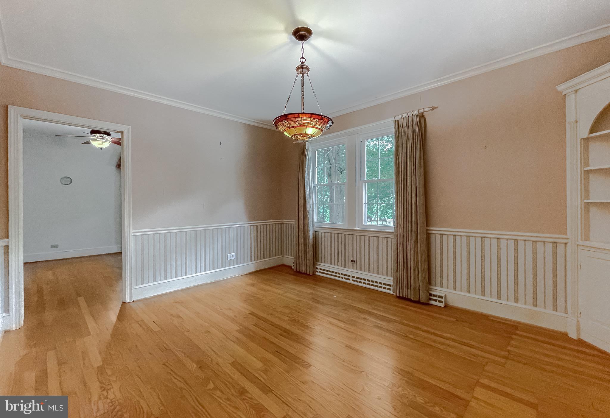 159 West Bay Front Road Lothian, MD 20711 - Photo 17 of 64 a view of a room with wooden floor fan and windows