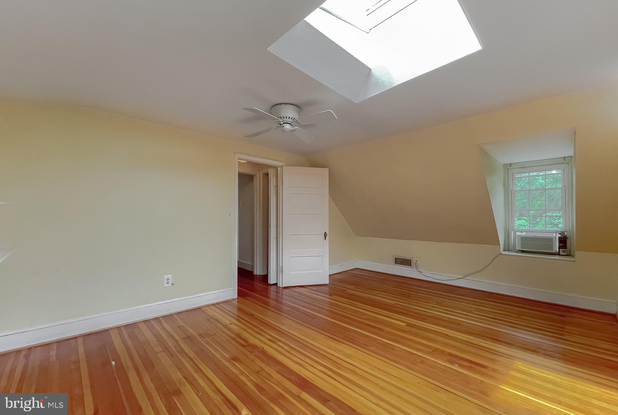 159 West Bay Front Road Lothian, MD 20711 - Photo 34 of 64 an empty room with wooden floor and windows
