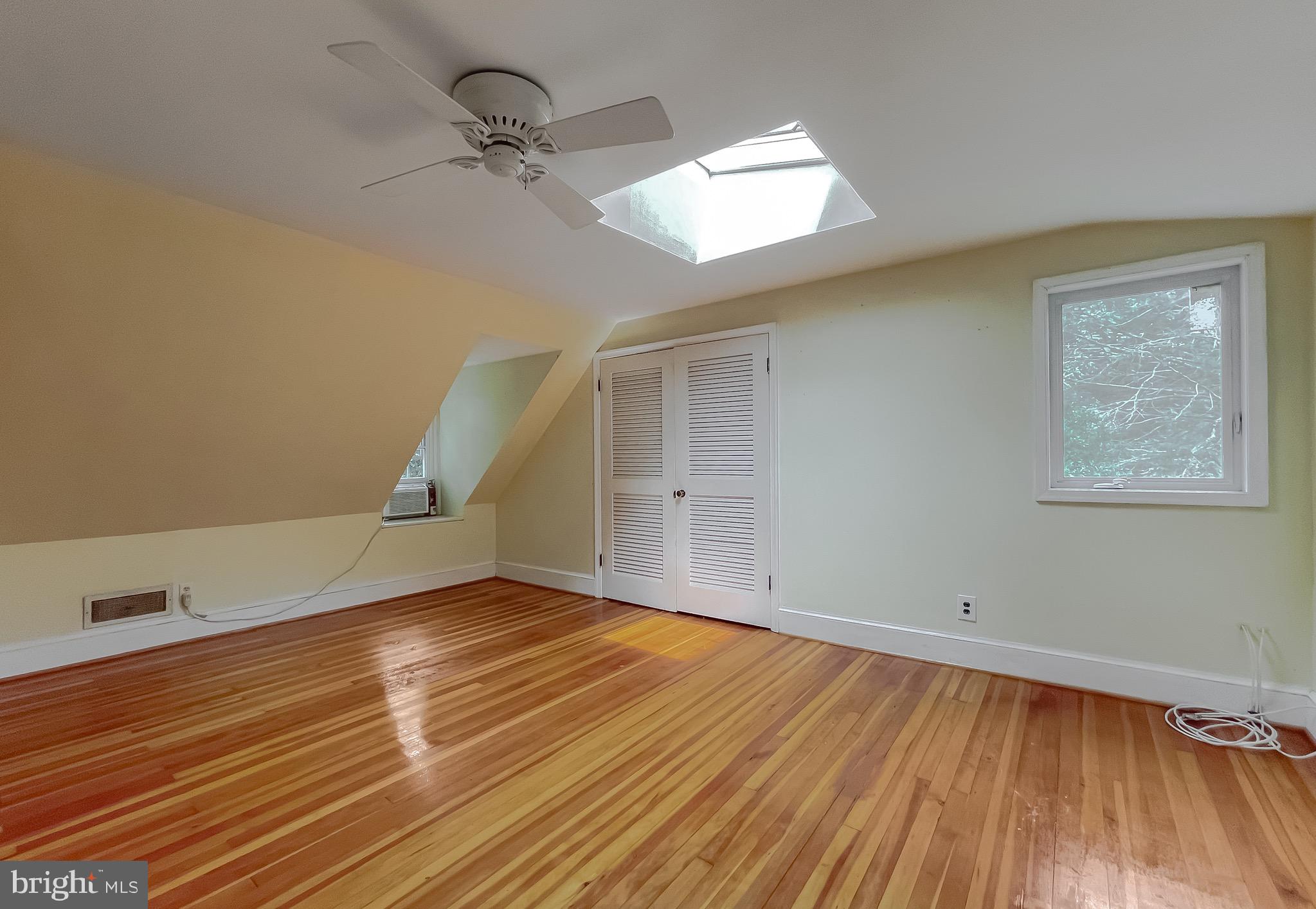 159 West Bay Front Road Lothian, MD 20711 - Photo 36 of 64 wooden floor in an empty room with a window