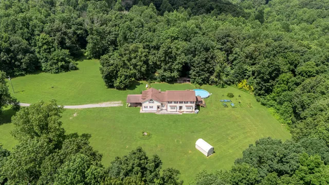 a front view of house with garden