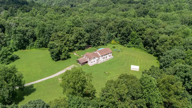 a view of a hallway view with staircase