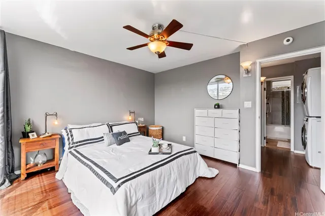 a living room with a bed furniture and a window
