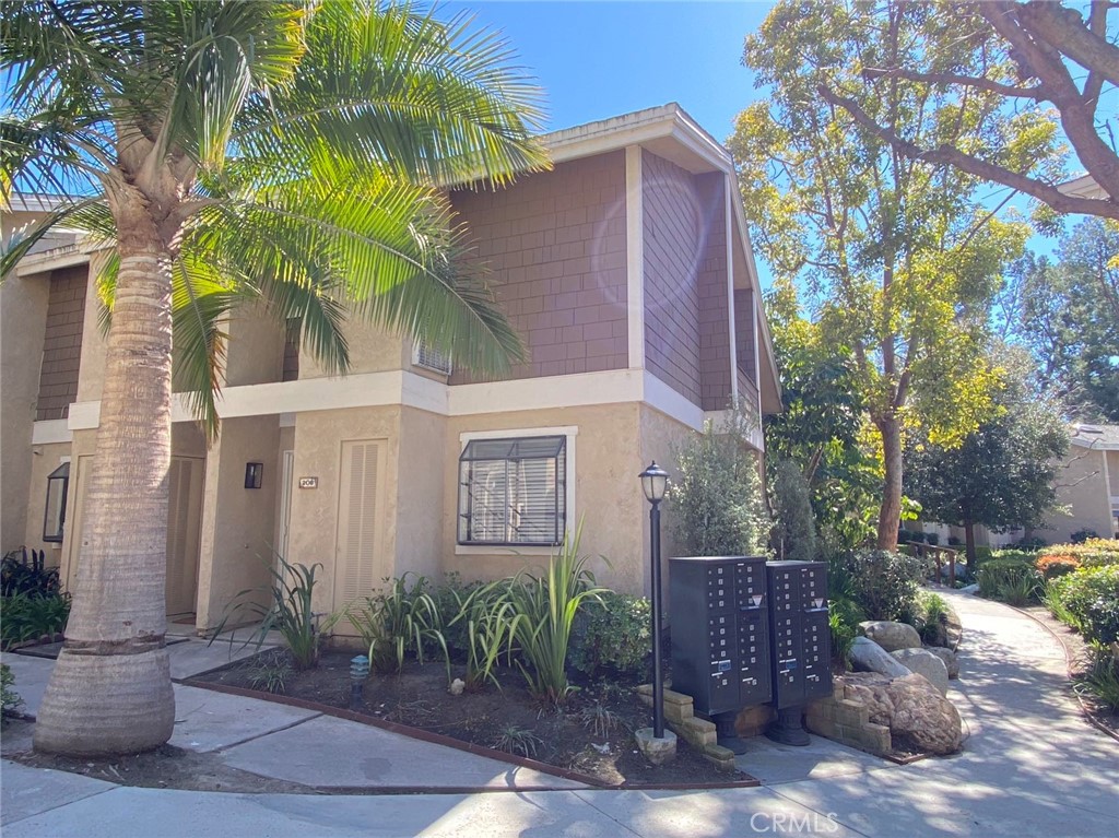 208 Pineview Irvine, CA 92620 - Photo 1 of 1 a sign that is on the side of a road