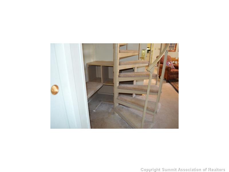 1937 Soda Ridge Road, Unit 1127 Keystone, CO 80435 - Photo 11 of 25 Storage. Clever storage under the stairs.
