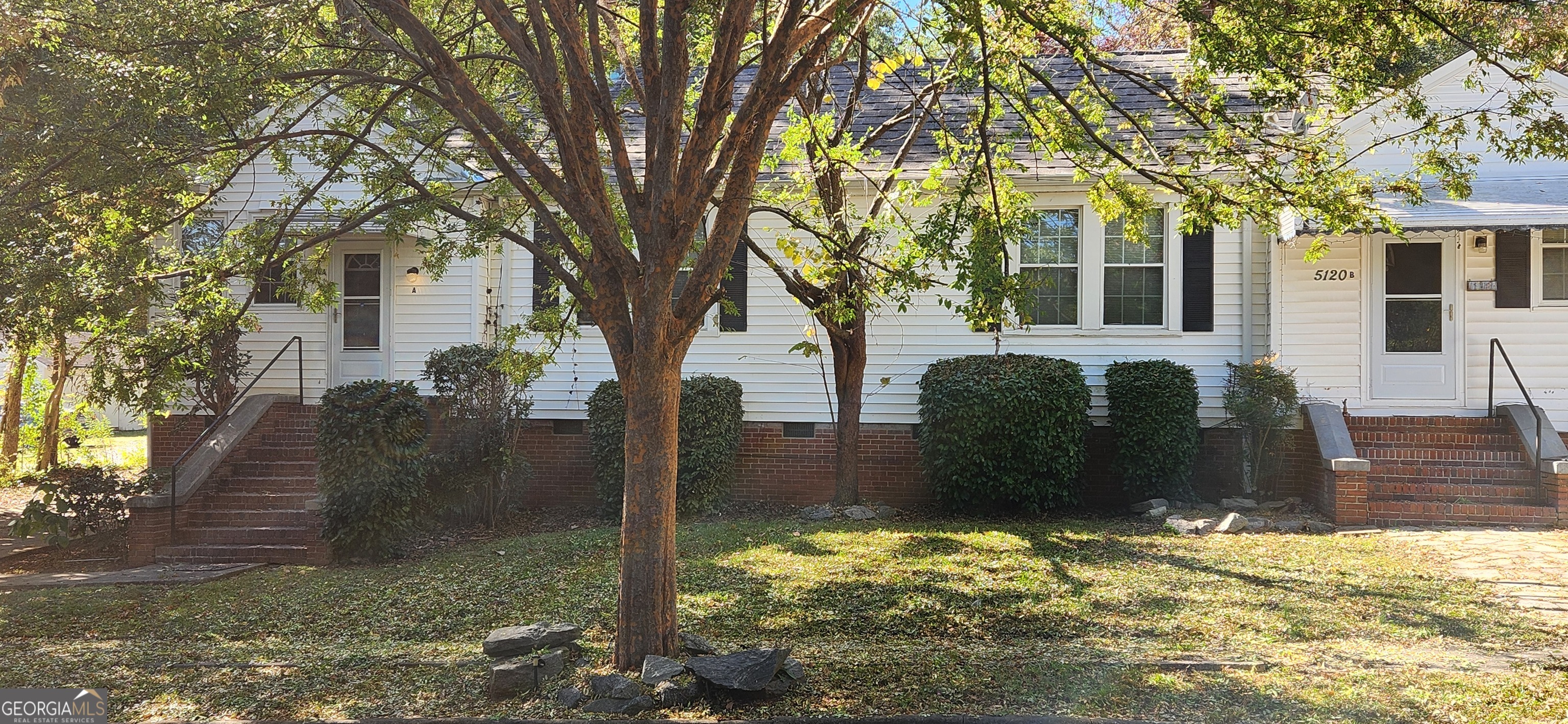 5120 A Newark Avenue Southwest Clarkdale, GA 30111 - Photo 1 of 11 a view of a house with a yard