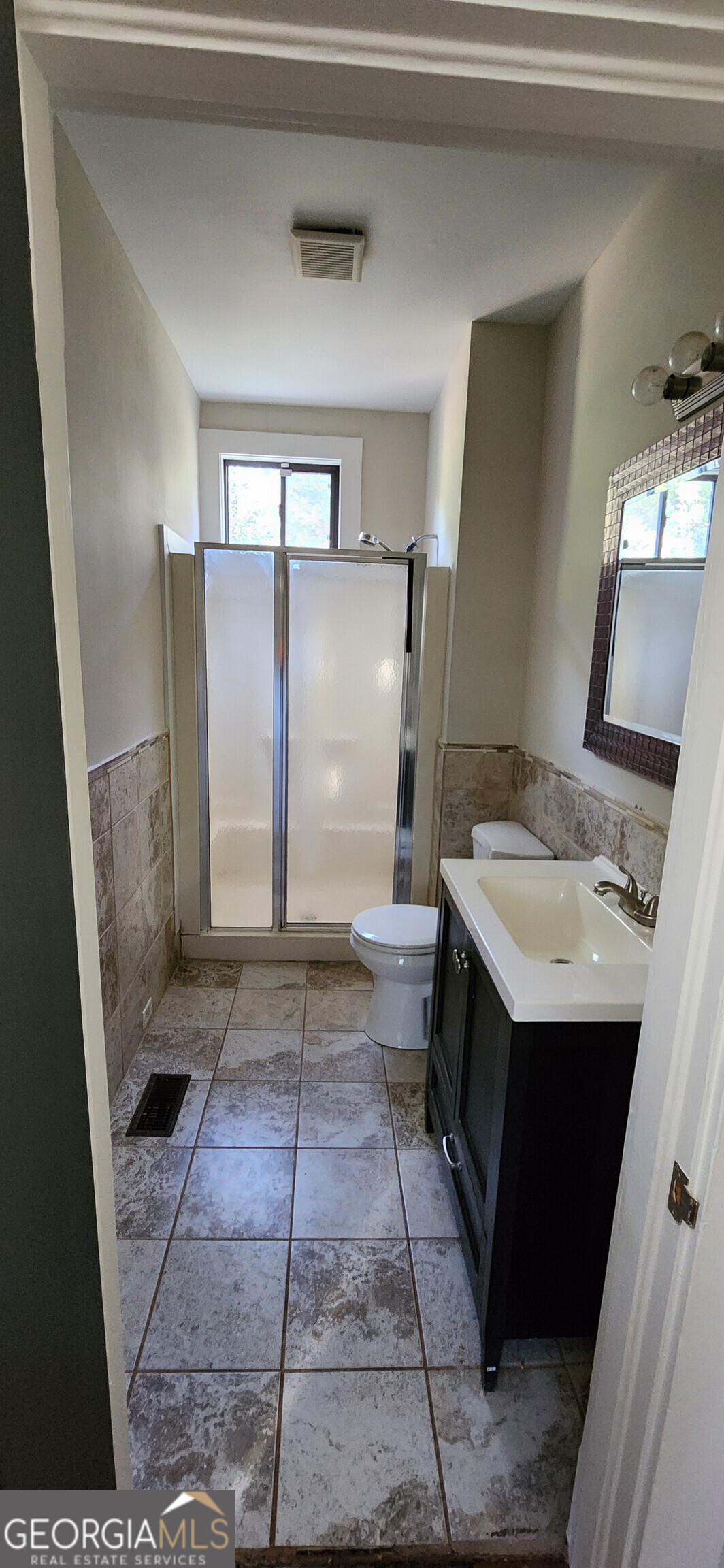 5120 A Newark Avenue Southwest Clarkdale, GA 30111 - Photo 6 of 11 a view of a bathroom with sink and mirror