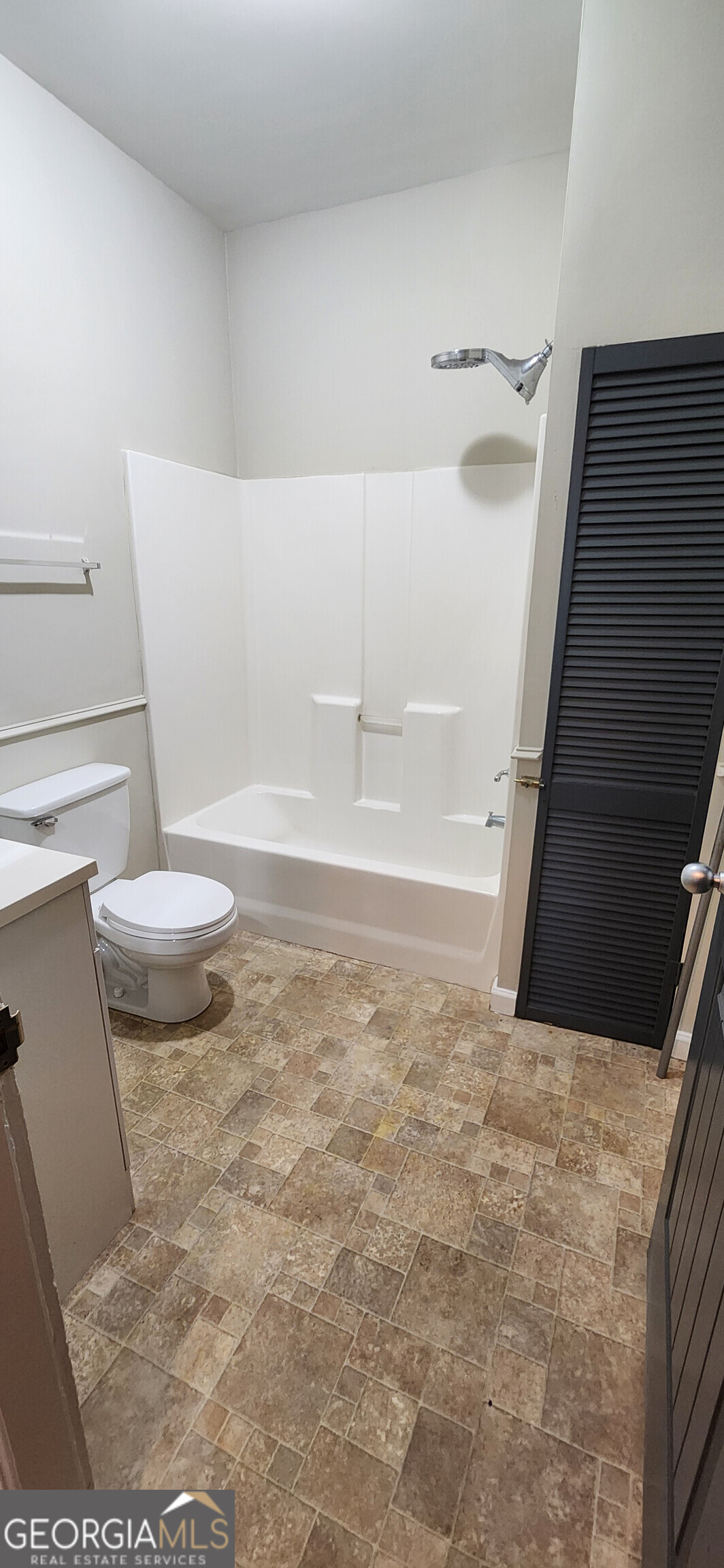 5120 A Newark Avenue Southwest Clarkdale, GA 30111 - Photo 7 of 11 a view of bathroom and toilet