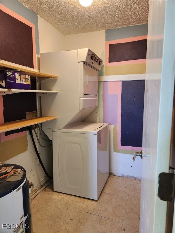 1420 Academy Boulevard, Unit 106 Cape Coral, FL 33990 - Photo 16 of 21 a utility room with dryer and washer