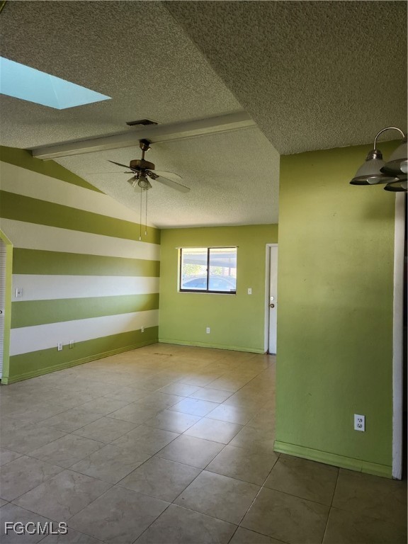 1420 Academy Boulevard, Unit 106 Cape Coral, FL 33990 - Photo 21 of 21 a view of a room with a ceiling fan and carpet