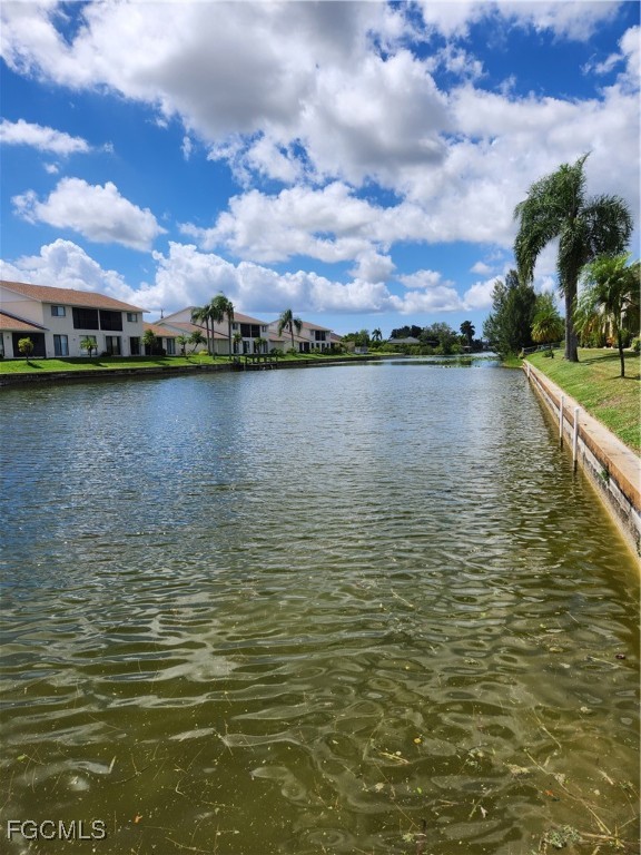1420 Academy Boulevard, Unit 106 Cape Coral, FL 33990 - Photo 6 of 21 a view of a lake view
