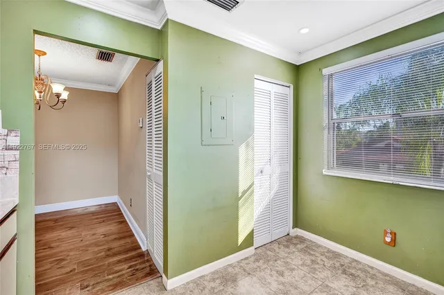 a kitchen with a stove and a microwave