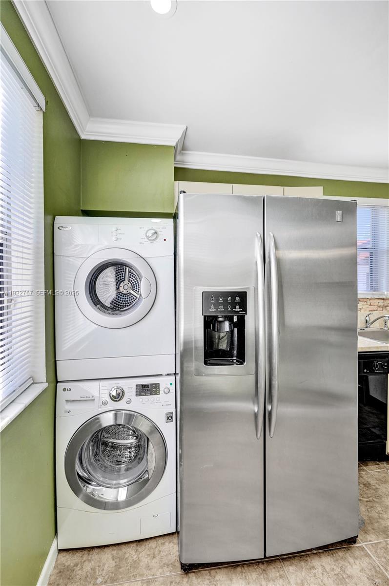 11201 Southwest 13th Street, Unit 204 Pembroke Pines, FL 33025 - Photo 17 of 33 a utility room with washer and dryer