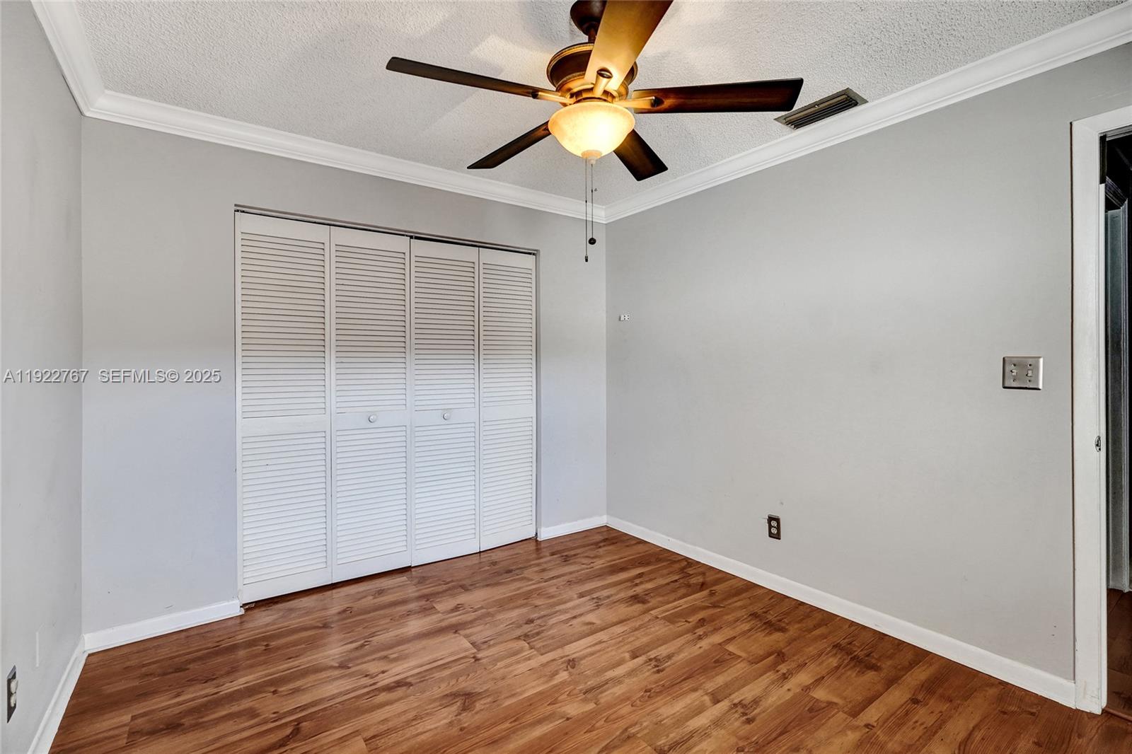 11201 Southwest 13th Street, Unit 204 Pembroke Pines, FL 33025 - Photo 31 of 33 a view of empty room with wooden floor