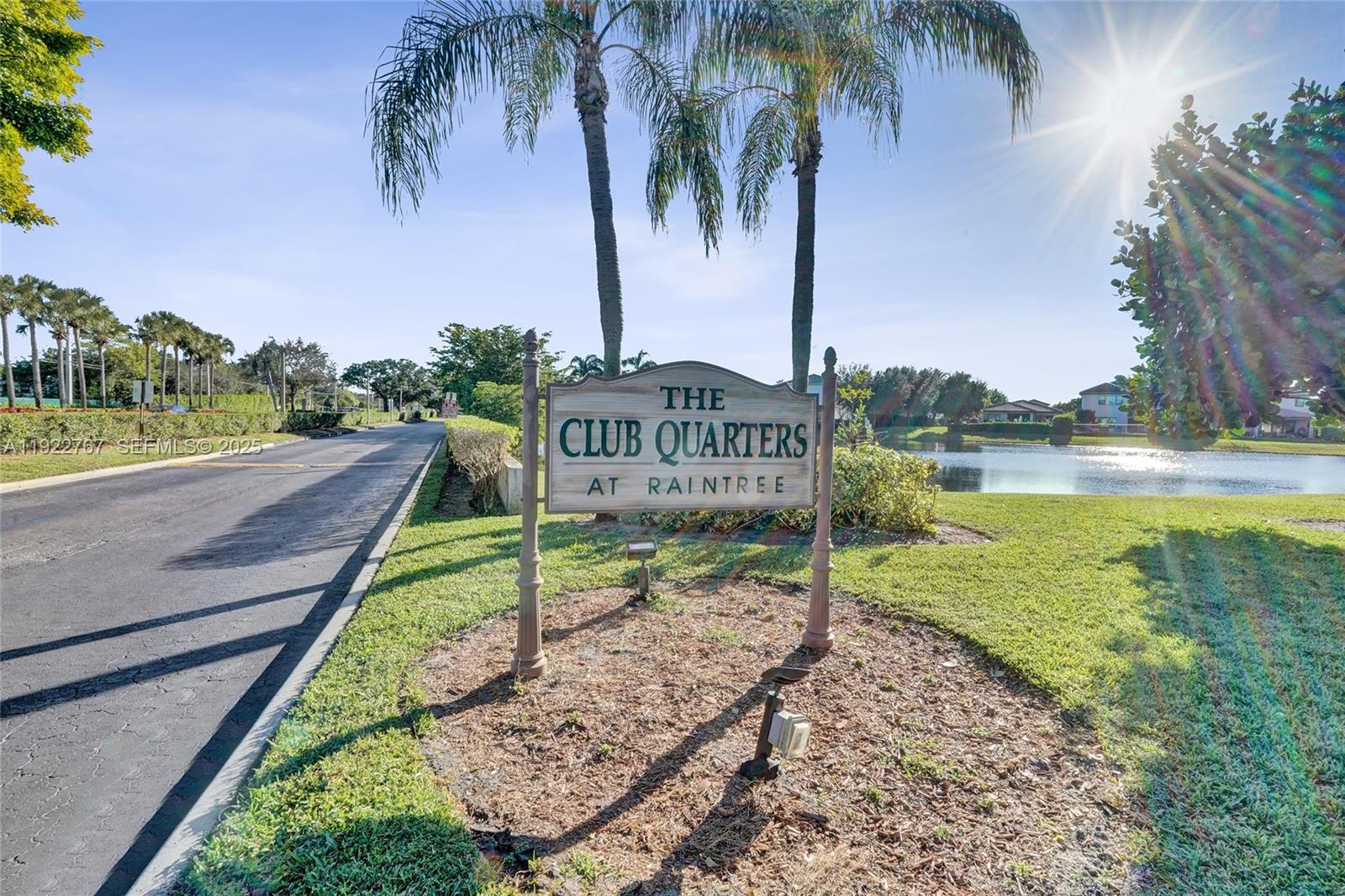 11201 Southwest 13th Street, Unit 204 Pembroke Pines, FL 33025 - Photo 32 of 33 a view of a yard with palm tree