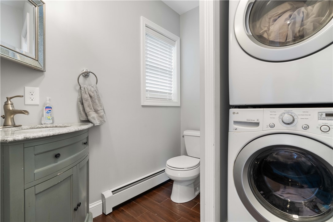 8 6th Street Warren, RI 02885 - Photo 14 of 41 First floor 1/2 bath with laundry.
