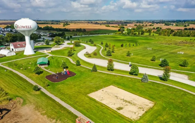 an aerial view of a house with outdoor space