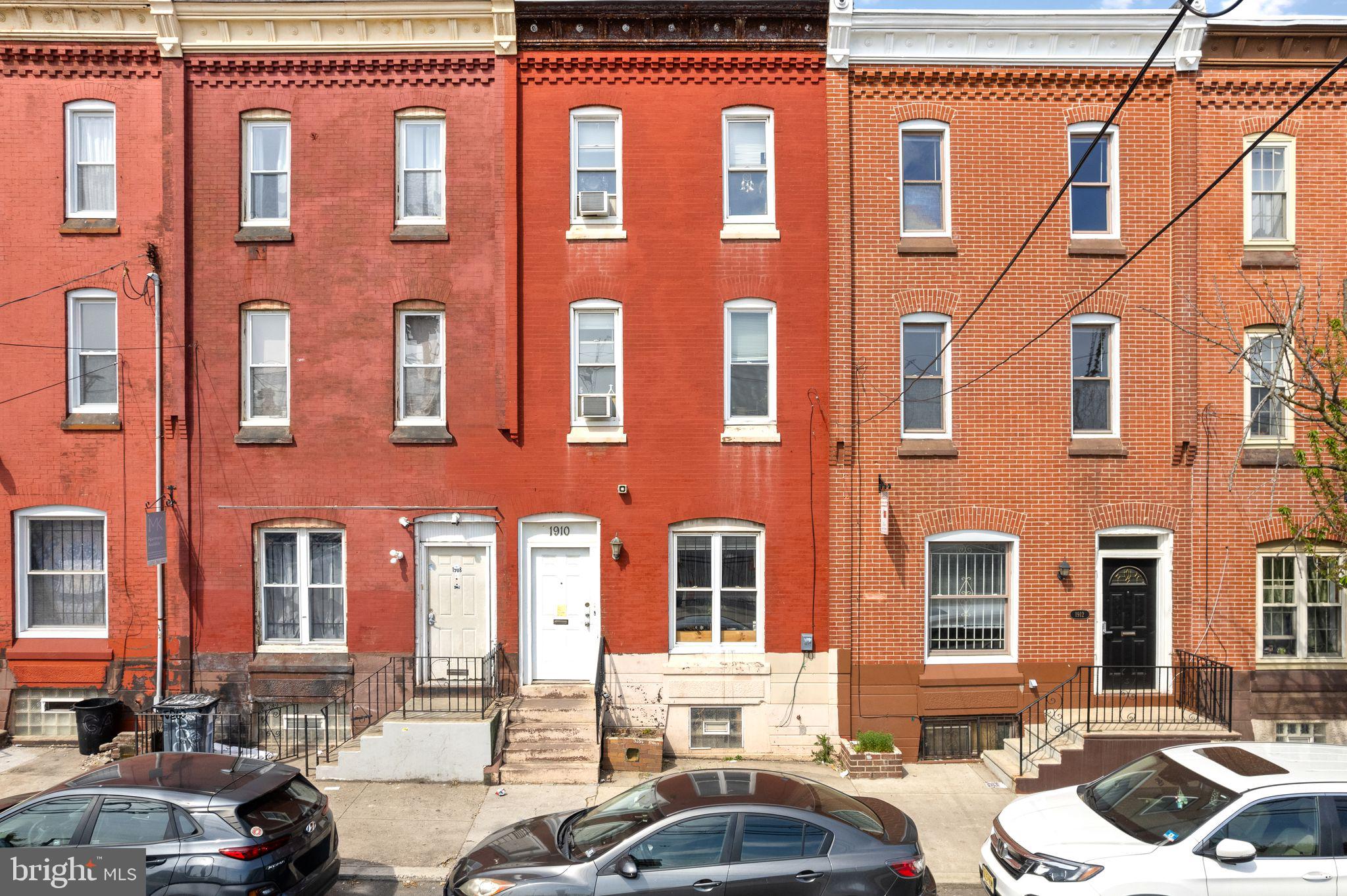 Charming row homes in vibrant hues.