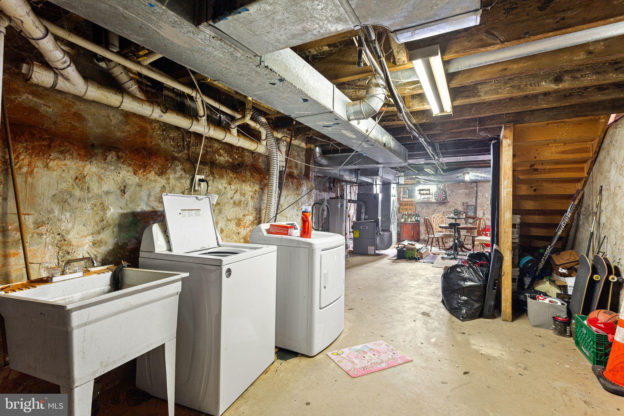 1910 North 17th Street Philadelphia, PA 19121 - Photo 13 of 14 Spacious basement with laundry area.