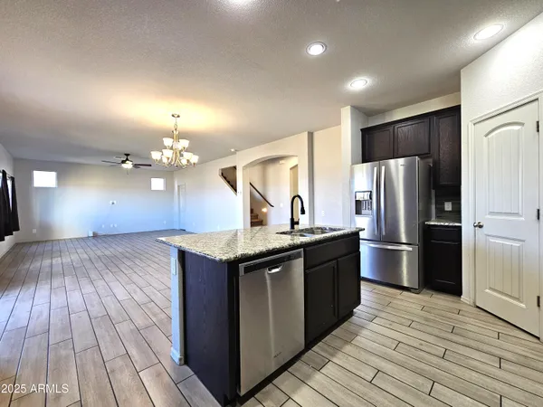 a view of a livingroom with wooden floor