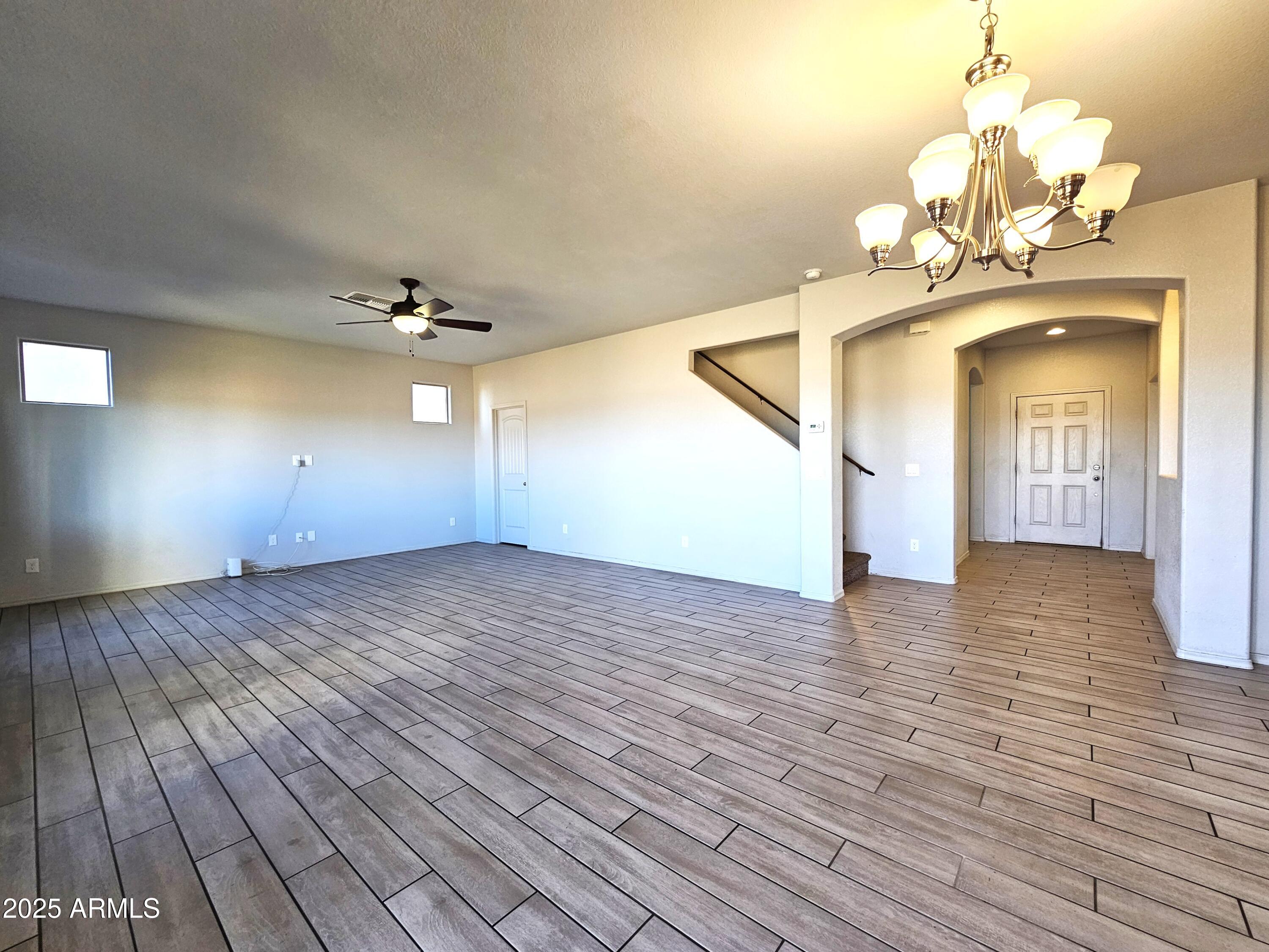 3443 Rhapsody Drive Sierra Vista, AZ 85650 - Photo 9 of 28 a view of a livingroom with wooden floor