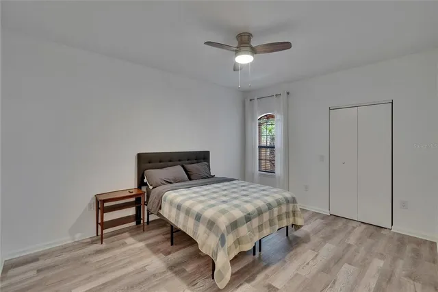 a view of a balcony with chair and door