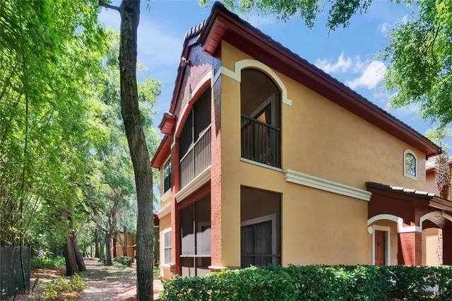 an aerial view of a house with outdoor space