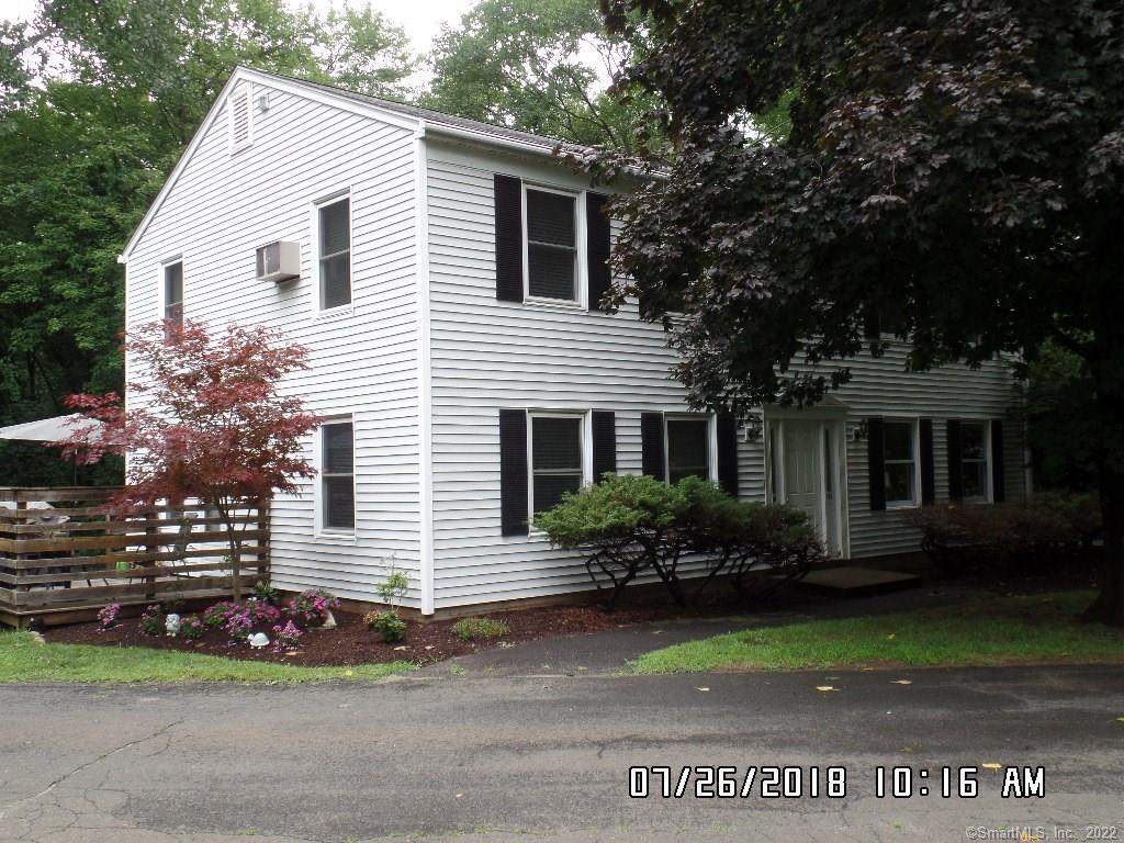 45 B Plumtrees Road, Unit B Bethel, CT 06801 - Photo 1 of 1 a view of a house with a yard