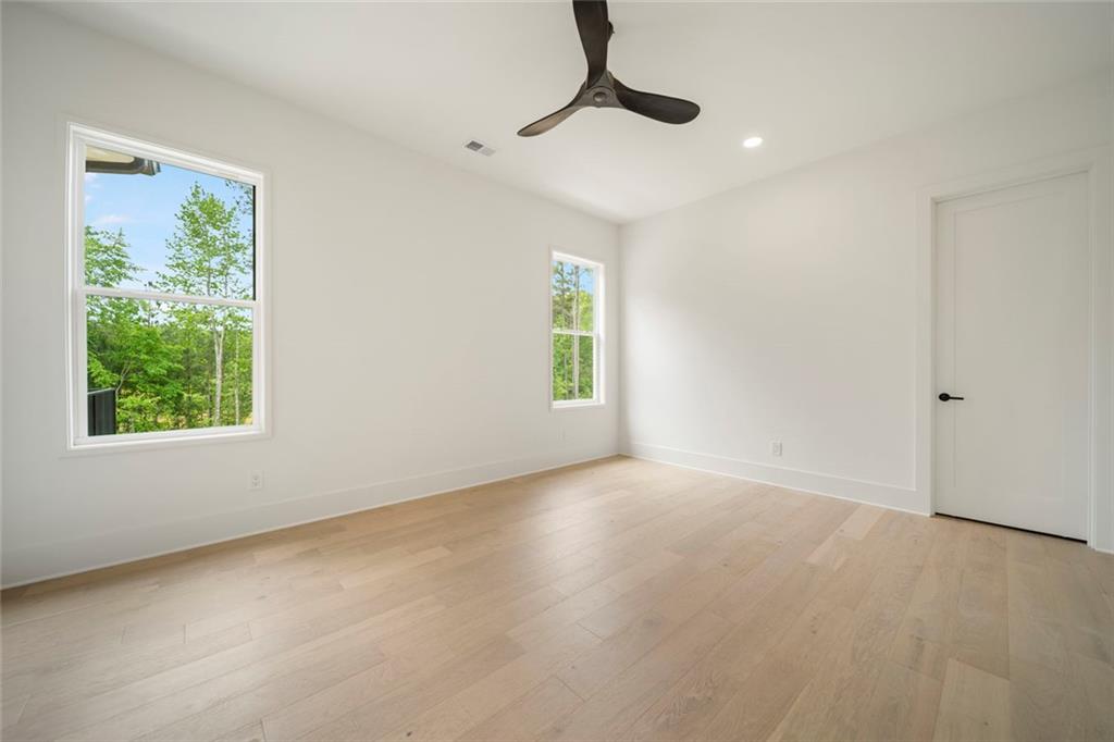 210 Simonton Road Southwest Lawrenceville, GA 30046 - Photo 40 of 55 a view of an empty room with a window