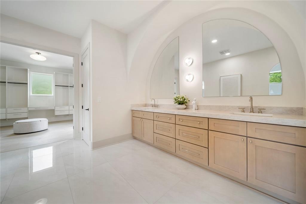 210 Simonton Road Southwest Lawrenceville, GA 30046 - Photo 47 of 55 a bathroom with a double vanity sink mirror and