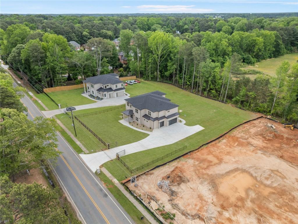 210 Simonton Road Southwest Lawrenceville, GA 30046 - Photo 7 of 55 a view of a backyard with seating area