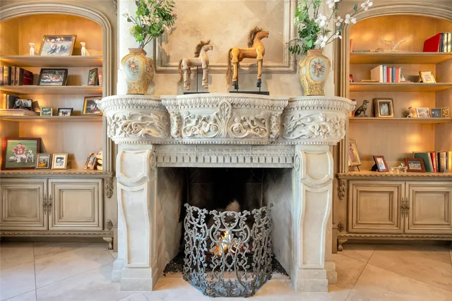 a view of a kitchen with furniture and a fireplace