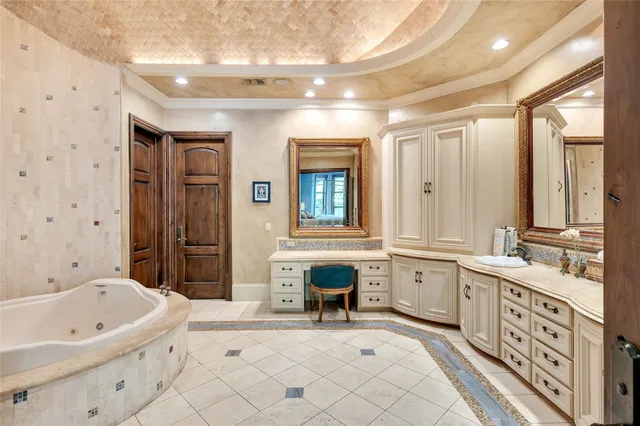 a room with a table chairs and a window