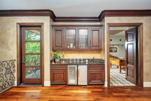 a bedroom with furniture and a book shelf