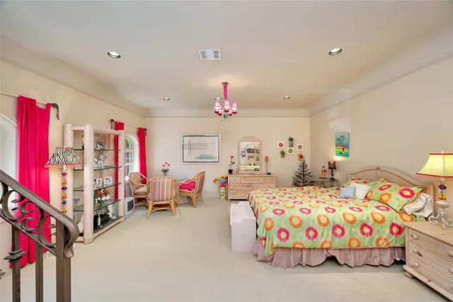 a bathroom with a granite countertop sink a toilet a mirror and bathtub