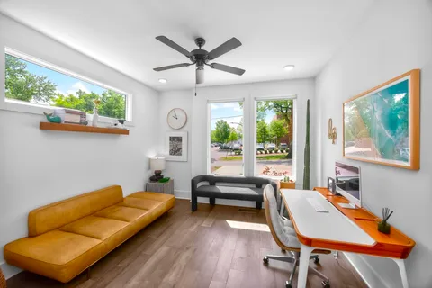 a living room with furniture and a window