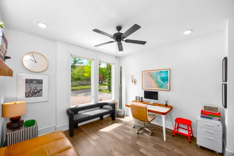 a living room with furniture and a window