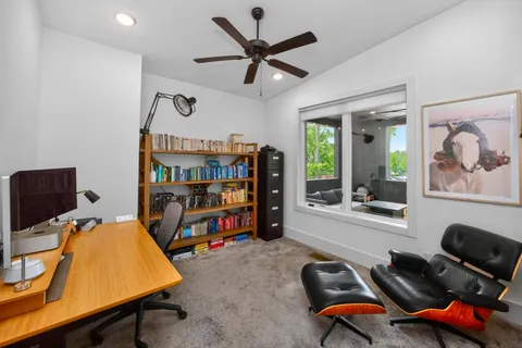 a room with furniture and a window