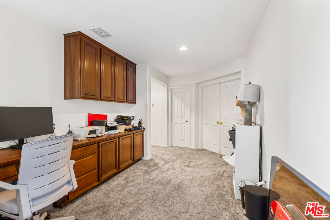 8256 Daisy Lane Riverside, CA 92508 - Photo 13 of 29 a kitchen with a refrigerator and a stove