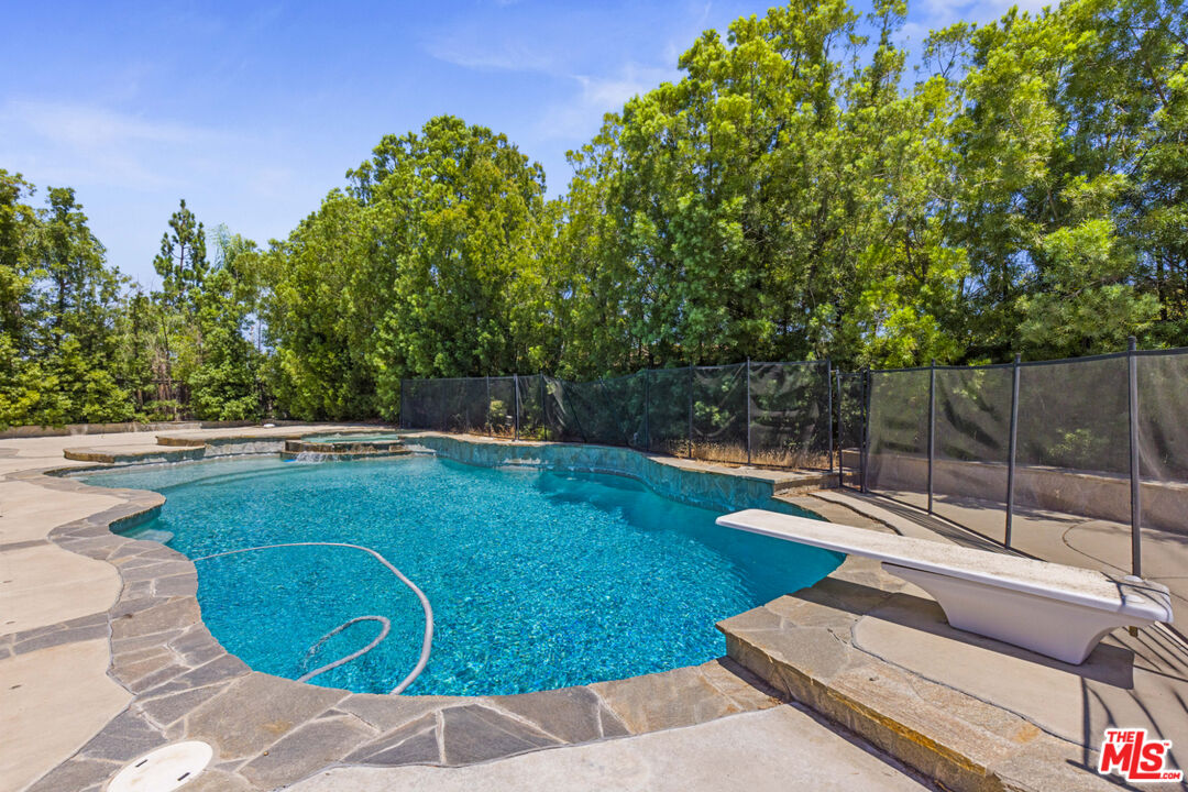8256 Daisy Lane Riverside, CA 92508 - Photo 25 of 29 a view of a backyard with sitting area