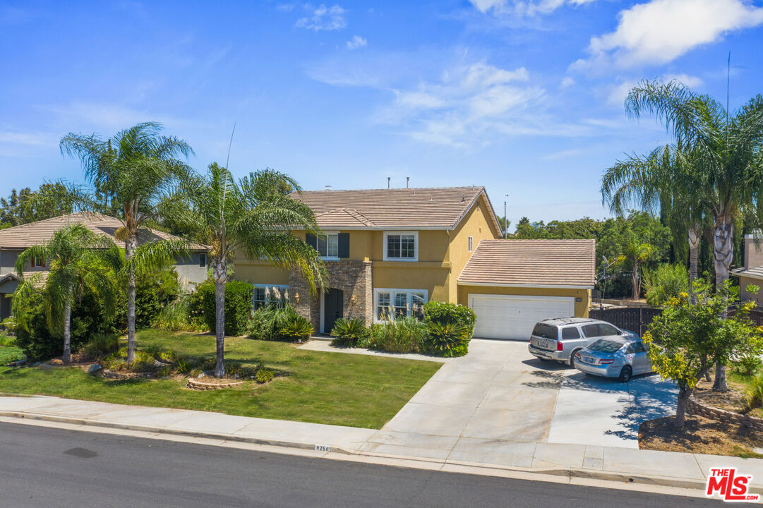 8256 Daisy Lane Riverside, CA 92508 - Photo 26 of 29 a front view of a house with a yard