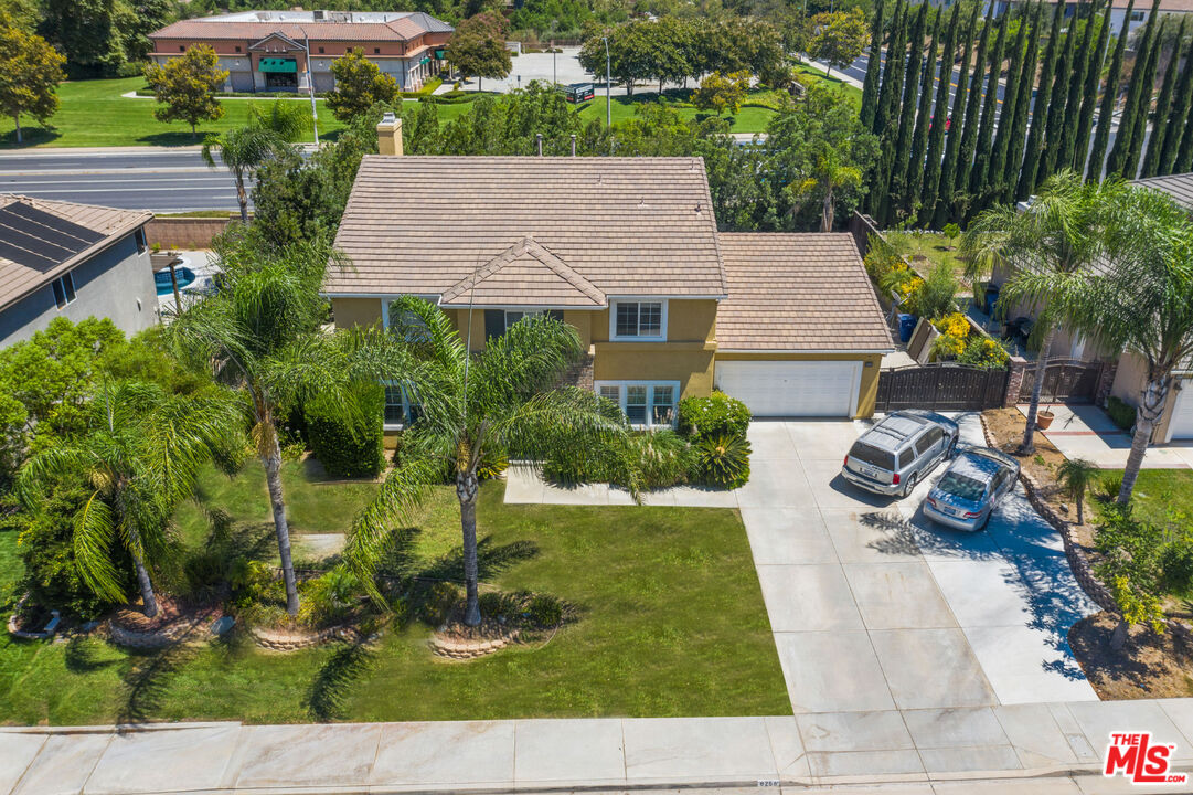 8256 Daisy Lane Riverside, CA 92508 - Photo 27 of 29 a view of house with garden space and street view