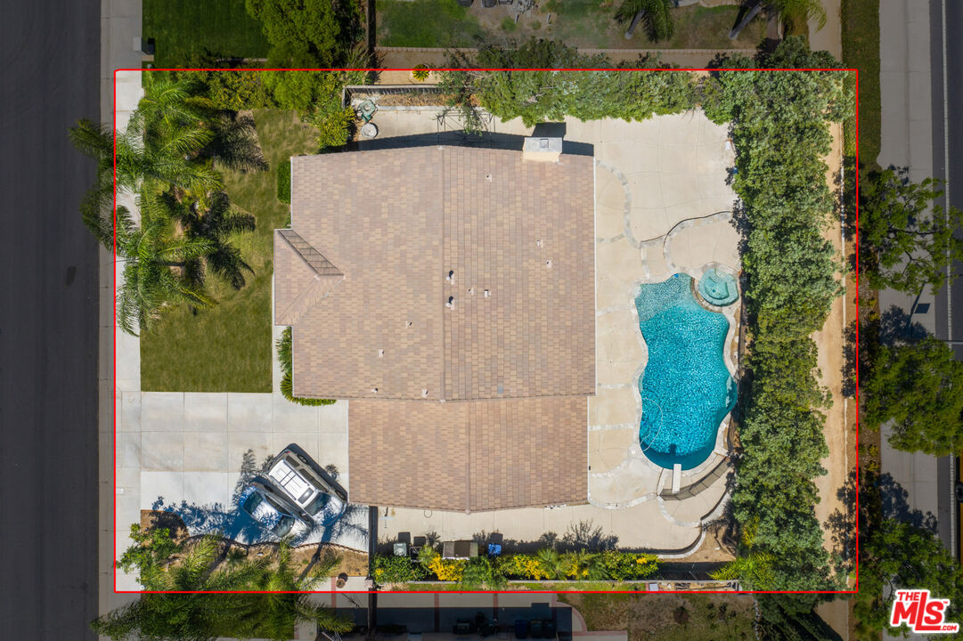 8256 Daisy Lane Riverside, CA 92508 - Photo 29 of 29 an aerial view of a house with a yard and a large tree