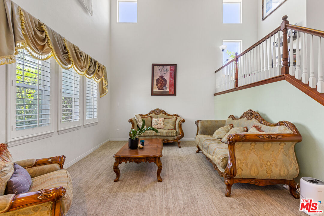 8256 Daisy Lane Riverside, CA 92508 - Photo 6 of 29 a living room with furniture and a window