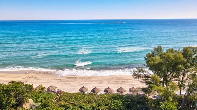 a view of a lake with a beach