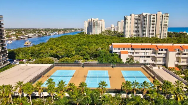 an aerial view of residential building and lake view